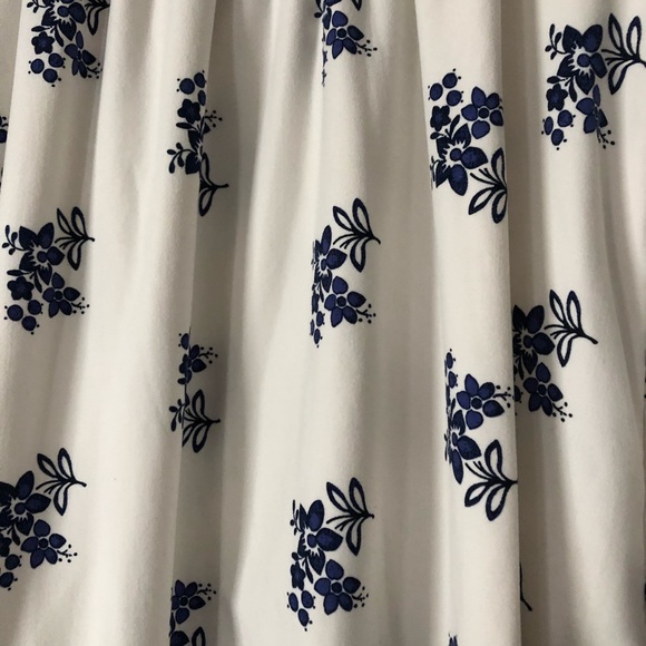 White longer sleeve shirt with blue flowers - Picture 8 of 8